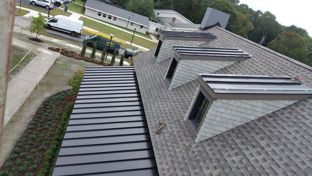 Metal roof installation on a residential home.